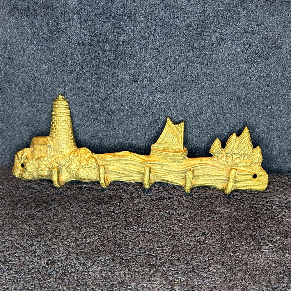 Key Hook by SPI Home. Cast bronze metal finish. New without tags.